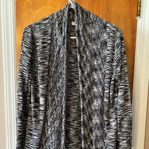 Black and white cardigan sweater.  Medium length size XL